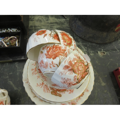 232 - Quantity of 19th Century Red and White Teaware.