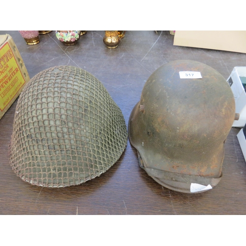 317 - German World War 1 and British World War 2 Helmets