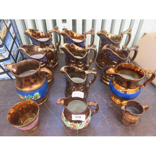 318 - Assortment of Lustre jugs