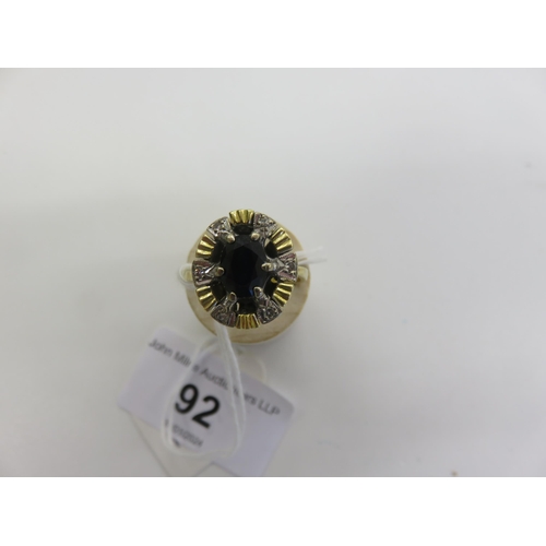 92 - 18ct. Gold Garnet and Diamond Ring