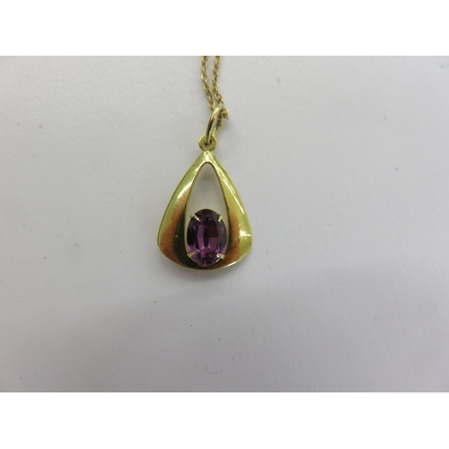 94 - 9ct. Gold Amethyst Type Pendant