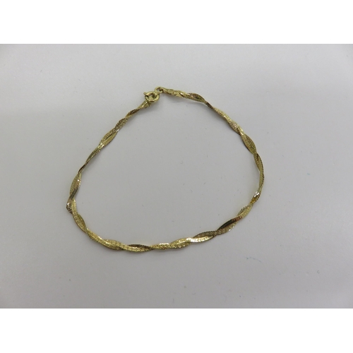 99 - 9ct. Gold Double Strand Bracelet, 1.1 grams