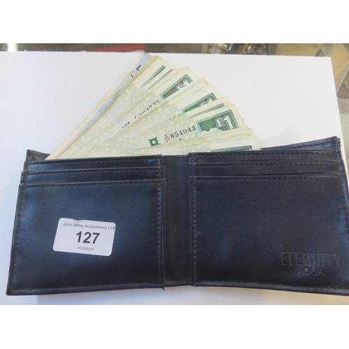 127 - Wallet containing forty nine £1 notes and Irish £5 note