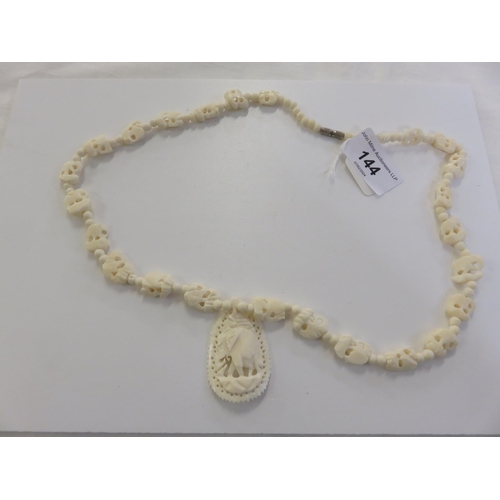 144 - Bone Necklace with Elephant Pendant