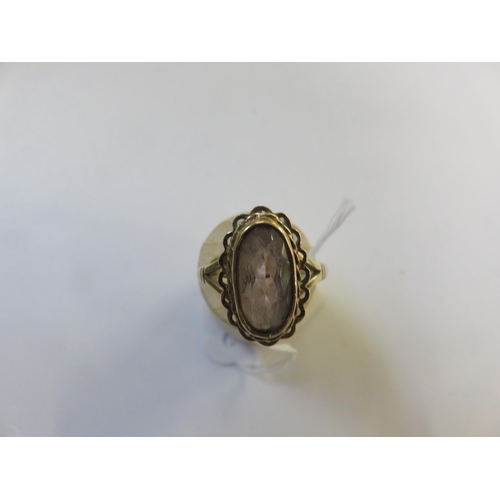 63 - 9ct. Gold and White Stone Dress Ring