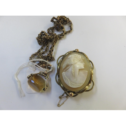 78 - Gilt Metal Chain with Citrine type swivel and gilt metal Cameo Brooch