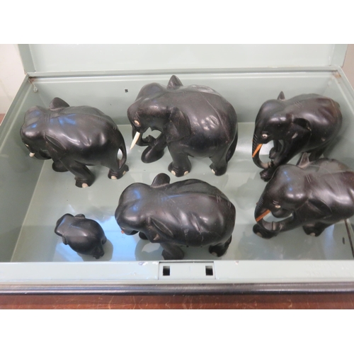 246 - Six Various Sized Carved Elephants in Metal Box