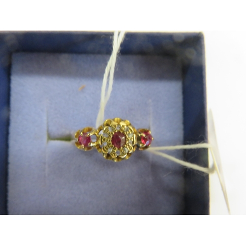 57 - 18ct Gold Diamond Chip and Red Stone Dress Ring