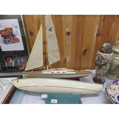 409 - Two small Model Wooden Yachts