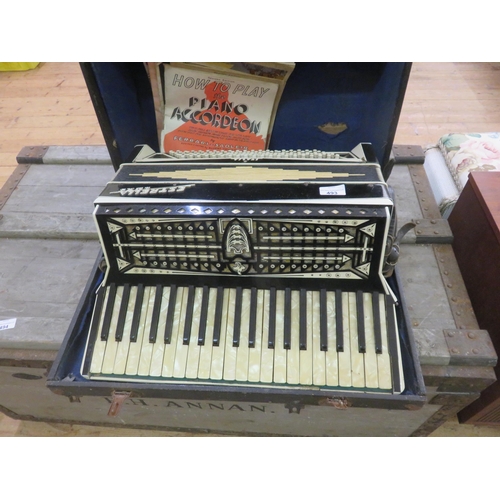 493 - Estrella Luxe Italian Accordion in Case and music books