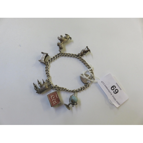 69 - Silver Charm Bracelet 32.3gms