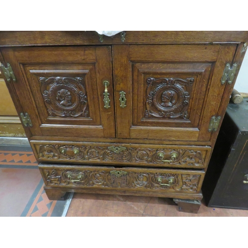 496 - Heavily Carved Oak Jacobean Style Two Door Cabinet