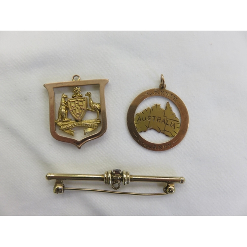 120 - Two odd 9ct. Gold Medallions and 9ct. Gold Bar Brooch