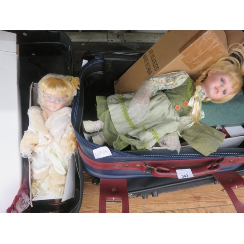 342 - Three Suitcases and Three Dolls