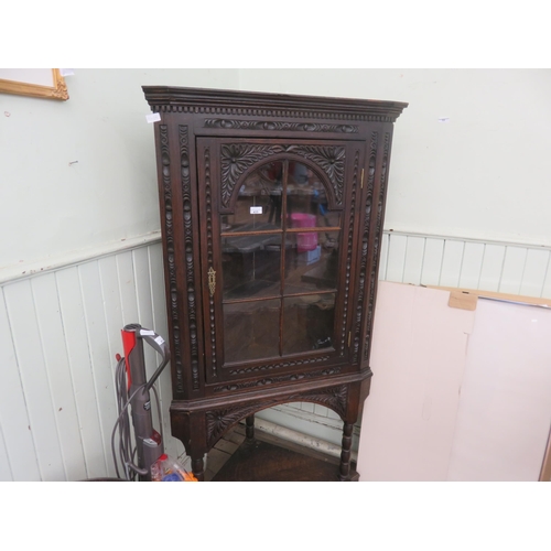 435 - Carved and Glazed Corner Cabinet