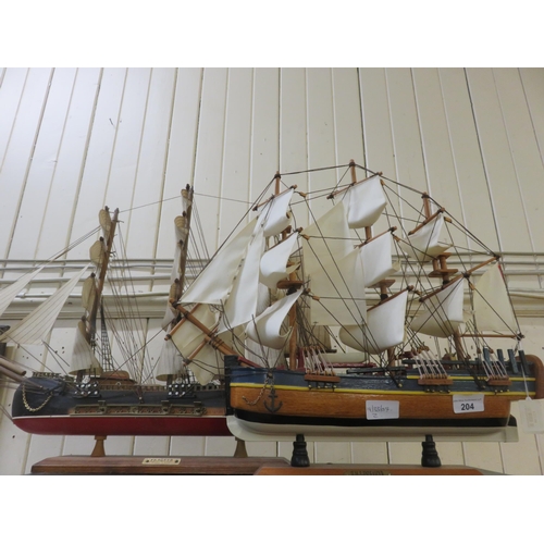 204 - Two Model Boats on stands