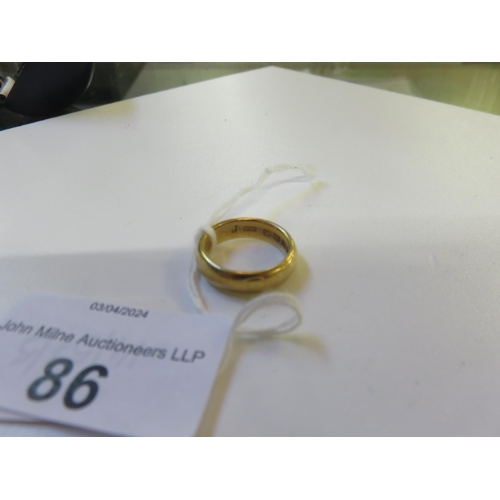 86 - 18ct. Gold Band 6.75 grams