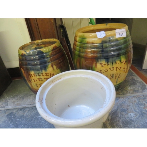 314 - Two Scottish Seaton Pottery Biscuit Barrels with lids and white butter jar