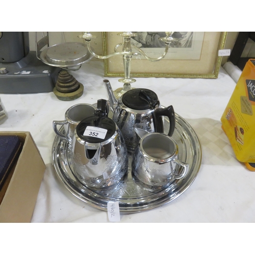 352 - Four piece Plated Tea Service and Candelabra