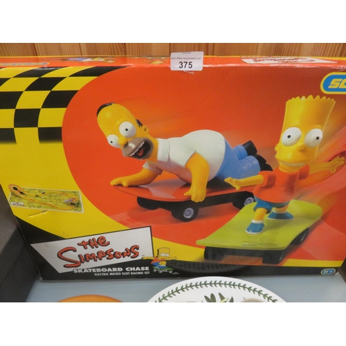 375 - The Simpsons Skateboard Chase Scalextric Set