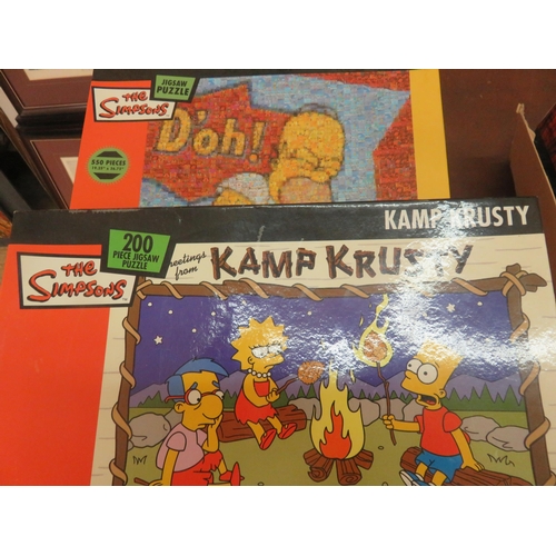 394 - Four Simpsons Jigsaw Puzzles