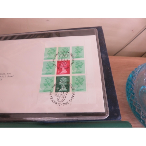 124 - Three Albums of First Day Covers, one empty album