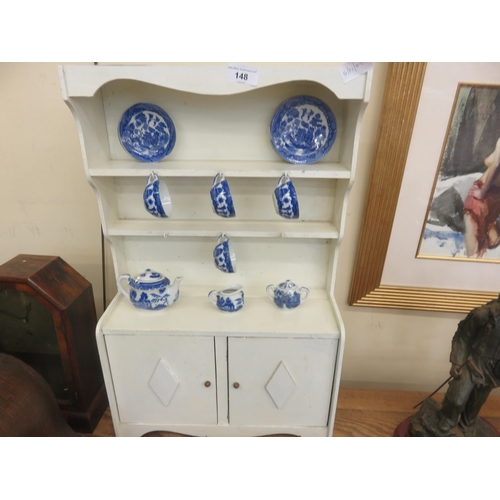 148 - Small Childs Wooden Dresser With Tea Set and Bag of Cutlery