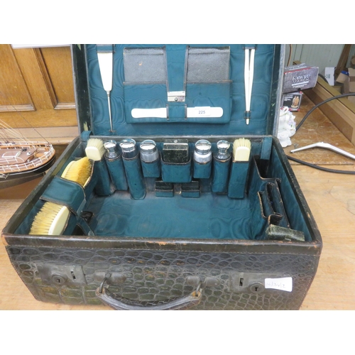 225 - Fitted Crocodile Skin Travel Case containing Five silver Topped Bottles and Other Travel Accessories