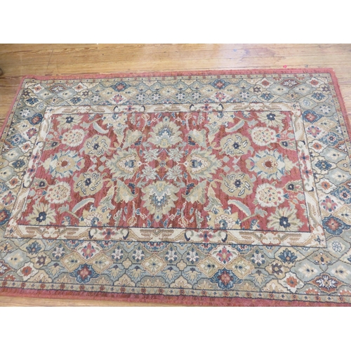 382 - Rug on Red and Green Ground, floral design