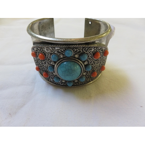 103 - White metal and turquoise bangle