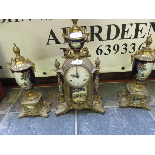 307 - Brass and Picture Panel. Three Part Clock Garniture