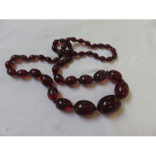 82 - Cherry Amber Style String of Beads