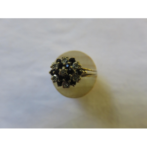 85 - 9ct Gold Diamond and Black Stone Dress Ring