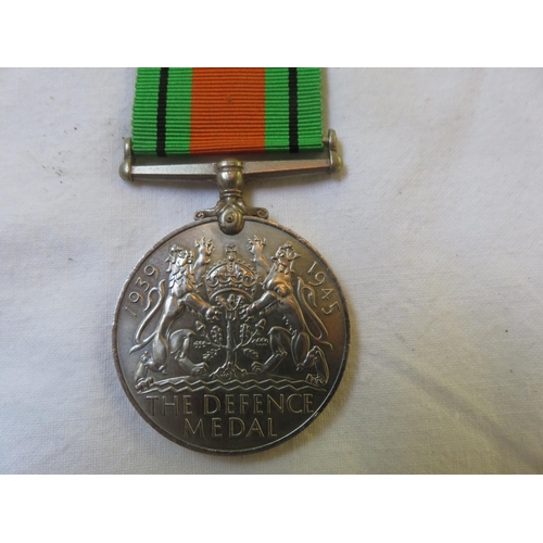 99 - 1939-45 Defence Medal to Miss A. Walker