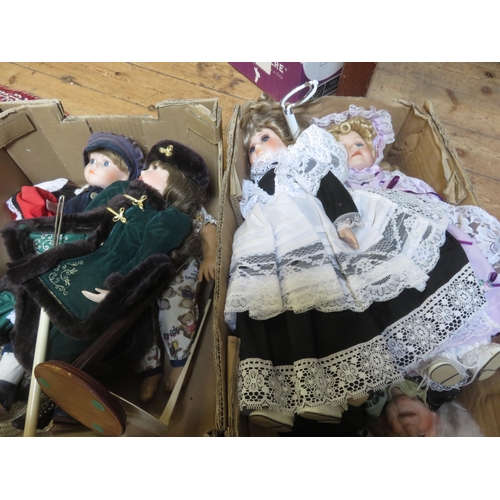 323 - Two boxes with Porcelain Dolls with stands