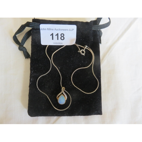 118 - 9ct. Gold Opal and White Stone Pendant