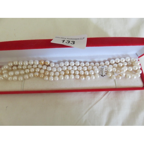 133 - Two strand cultured pearl necklace with silver closure