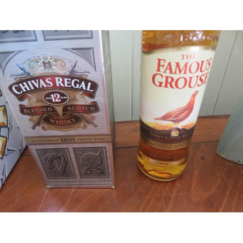 391 - 70cl Famous Grouse and Chivas Regal