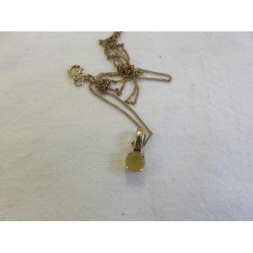 158 - 9ct. Gold Chain with Citrine Type Pendant