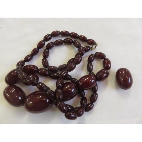 168 - String of Cherry Amber Beads