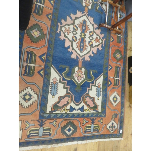 423 - Kilin Rug on Blue Ground with central medallion design