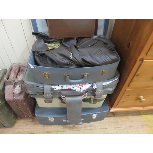 444 - Five Suitcases with leather, fur, sheepskin clothing