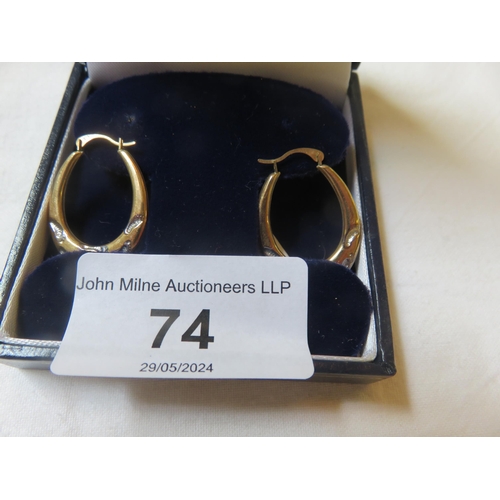 74 - Pair of 9ct. Gold Hoop Earrings, 1 gram weight