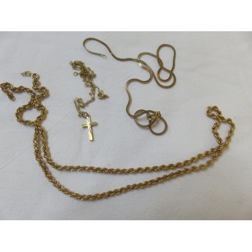 89 - 9ct. Gold Crucifix on Chain and two 9ct. Gold Chains 8.5 grams