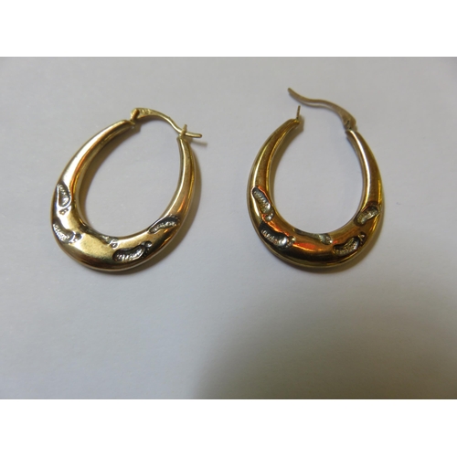 74 - Pair of 9ct. Gold Hoop Earrings, 1 gram weight