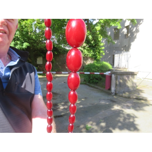 168 - String of Cherry Amber Beads