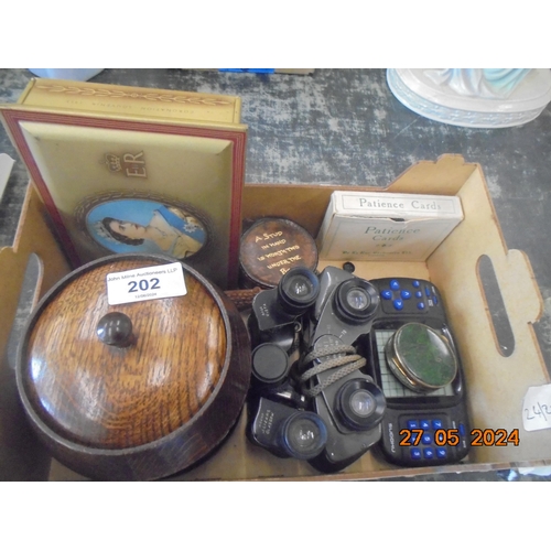 202 - Small lot of Binoculars, Soduku Game, Queen Elizabeth II Tin, etc