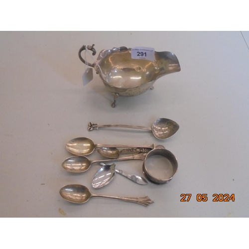 291 - Silver Cream Jug, Silver and Plated Spoons, Silver Napkin Ring, 4 Troy ounces weighable Silver.