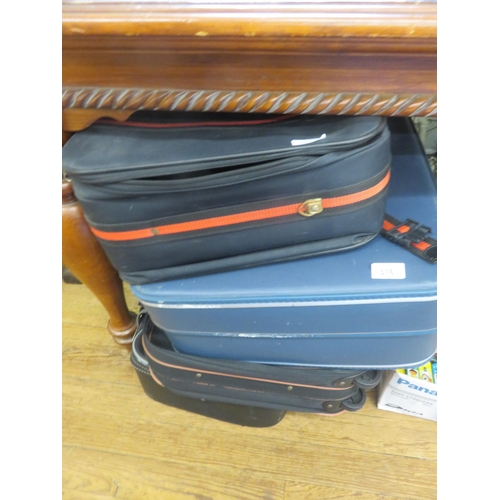 376 - Four Various Suitcases