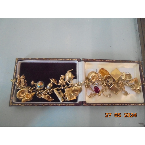 83 - 9ct Gold Charm Bracelet, 70.7 grams Total